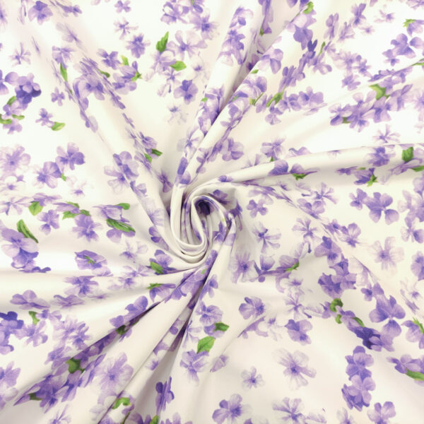 Tessuto Rasatello di Cotone a fantasia motivo floreale bianco - lilla