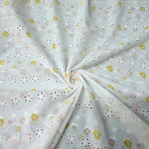 Tessuto Sangallo a fantasia motivo floreale bianco - rosa - giallo