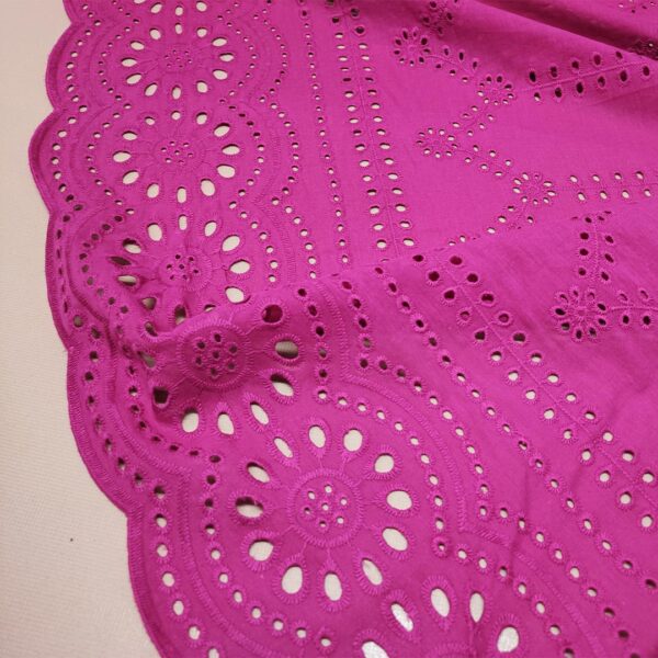 Tessuto Sangallo tinta unita motivo astratto fucsia