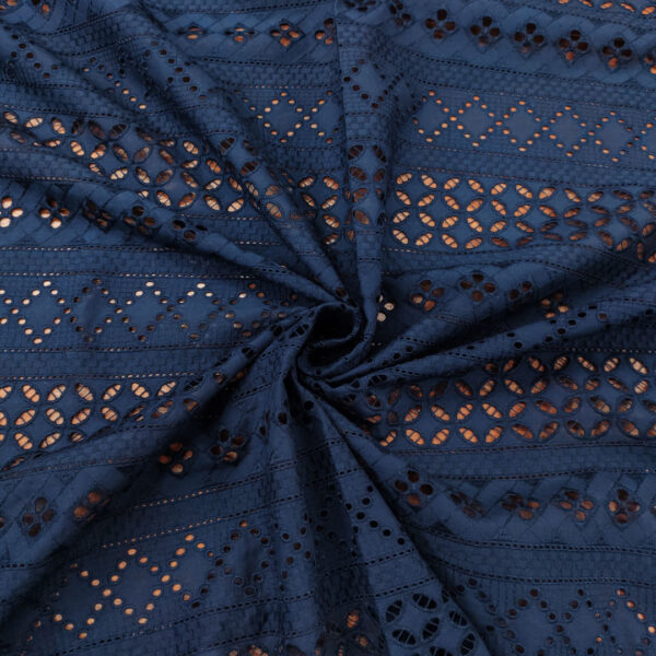 Tessuto Sangallo tinta unita motivo geometrico blu