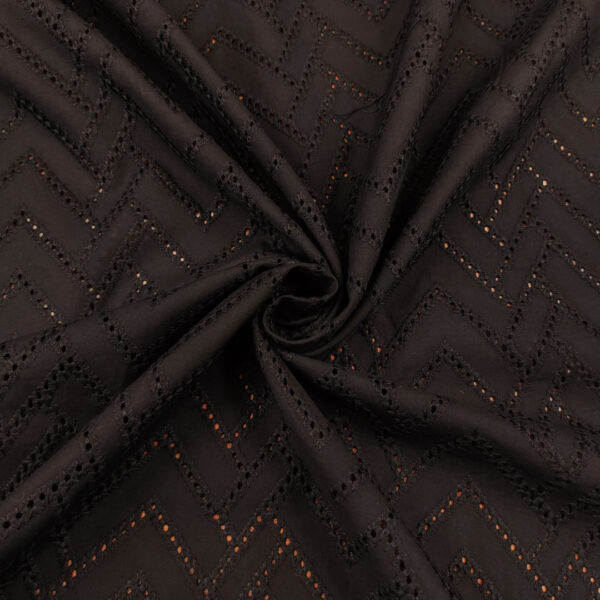 Tessuto Sangallo tinta unita motivo geometrico nero