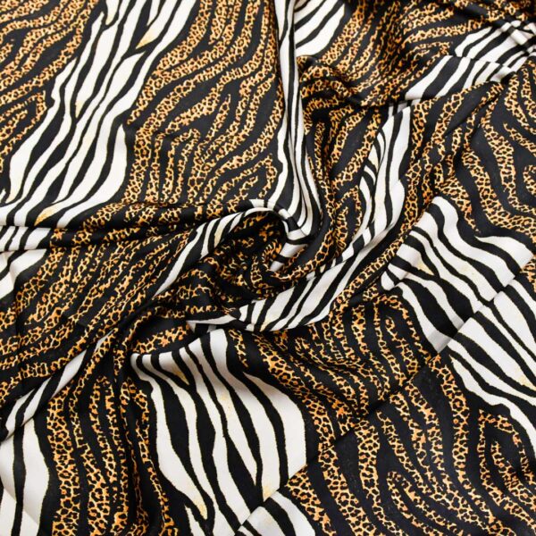 Tessuto Satin a fantasia motivo animalier beige - nero - giallo