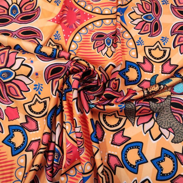 Tessuto Satin a fantasia motivo astratto arancio - blu - giallo