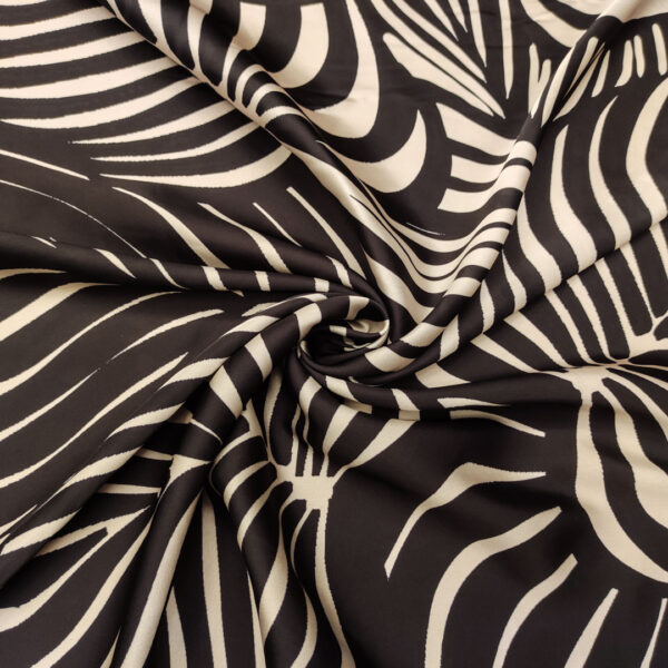 Tessuto Satin a fantasia motivo astratto beige - nero