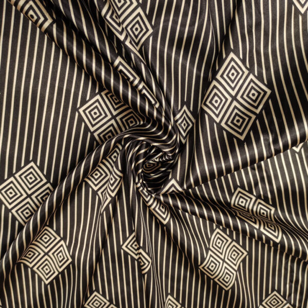 Tessuto Satin a fantasia motivo astratto beige scuro - nero