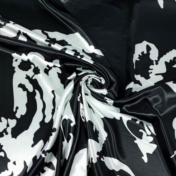 Tessuto Satin elasticizzato a fantasia motivo astratto bianco - nero