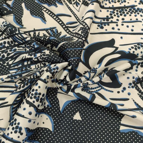 Tessuto Satin a fantasia motivo astratto bianco seta - blu - avio