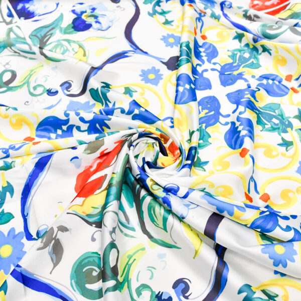 Tessuto Satin a fantasia motivo astratto blu elettrico - giallo - bianco