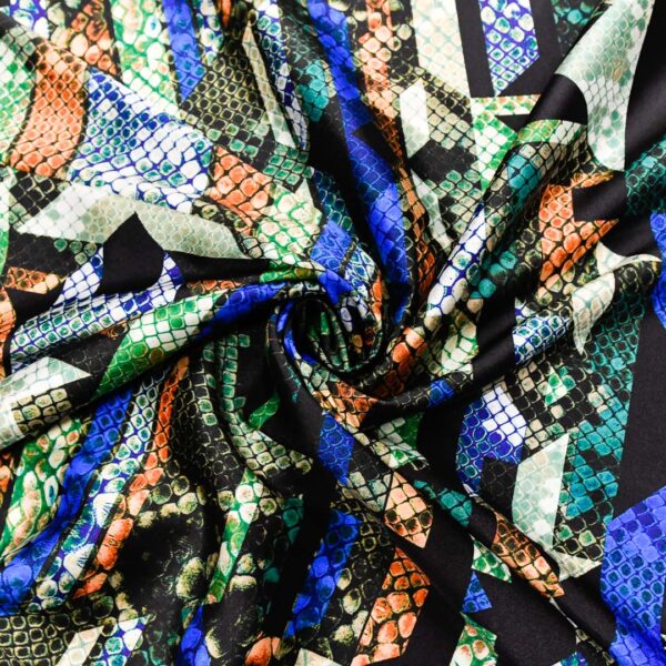 Tessuto Satin a fantasia motivo astratto blu - verde