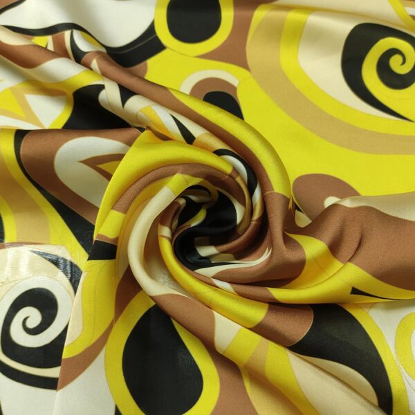 Tessuto Satin a fantasia motivo astratto giallo - marrone - nero