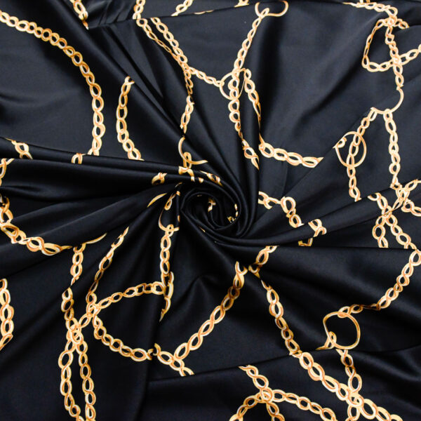 Tessuto Satin a fantasia motivo astratto giallo - nero