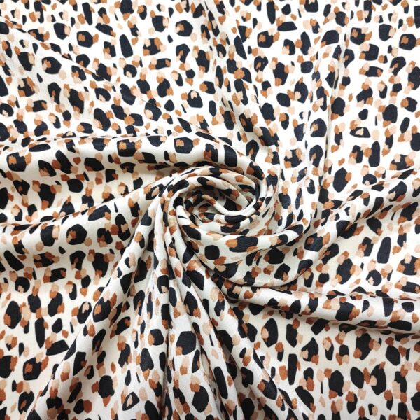 Tessuto Satin a fantasia motivo astratto nero - panna - ruggine