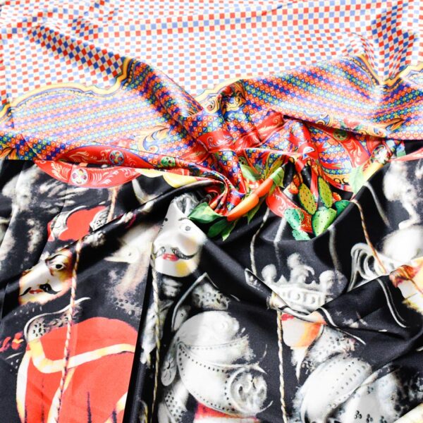 Tessuto Satin a fantasia motivo astratto nero - rosso