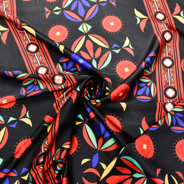 Tessuto Satin a fantasia motivo astratto nero - rosso - giallo