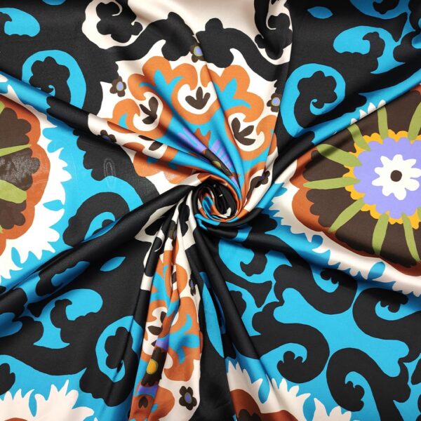 Tessuto Satin a fantasia motivo astratto turchese - nero - ruggine