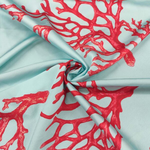 Tessuto Satin a fantasia motivo astratto verde acqua - rosso corallo