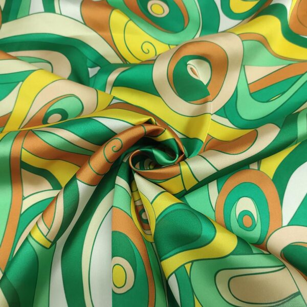 Tessuto Satin a fantasia motivo astratto verde - coccio - ocra