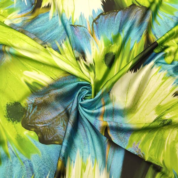 Tessuto Satin a fantasia motivo astratto verde fluo - turchese