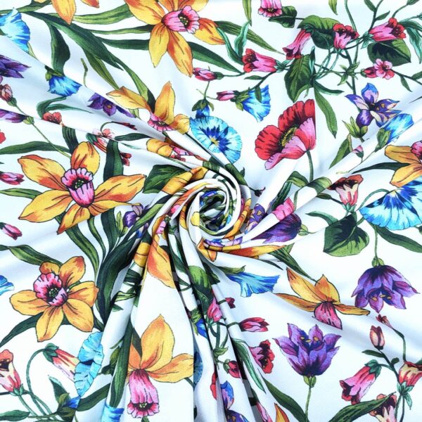 Tessuto Satin elasticizzato a fantasia motivo floreale bianco - giallo - fucsia - turchese