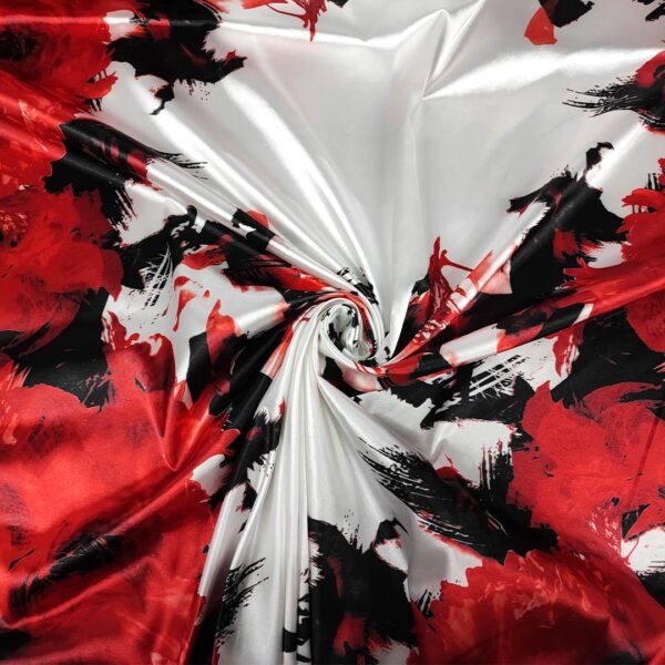 Tessuto Satin elasticizzato a fantasia motivo floreale bianco - nero - rosso