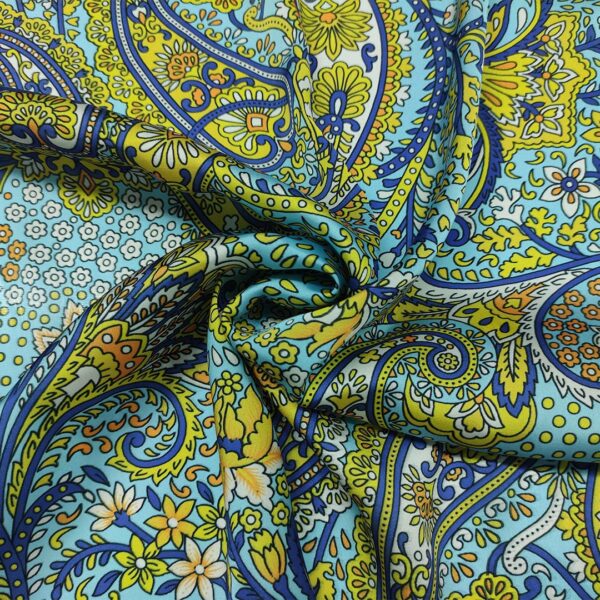 Tessuto Satin a fantasia motivo floreale cashmere giallo - celeste - blu