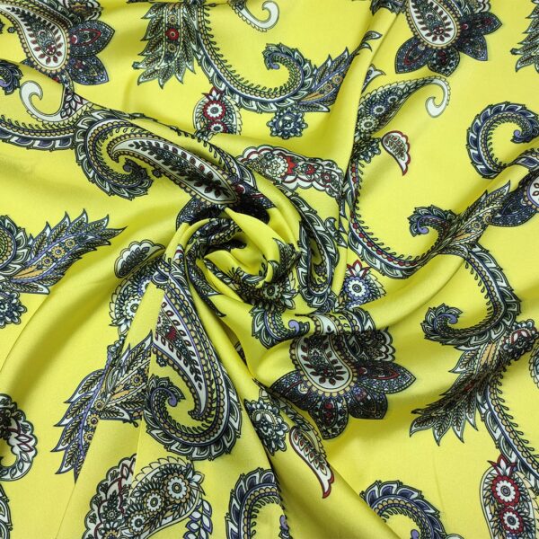 Tessuto Satin a fantasia motivo floreale cashmere giallo - nero