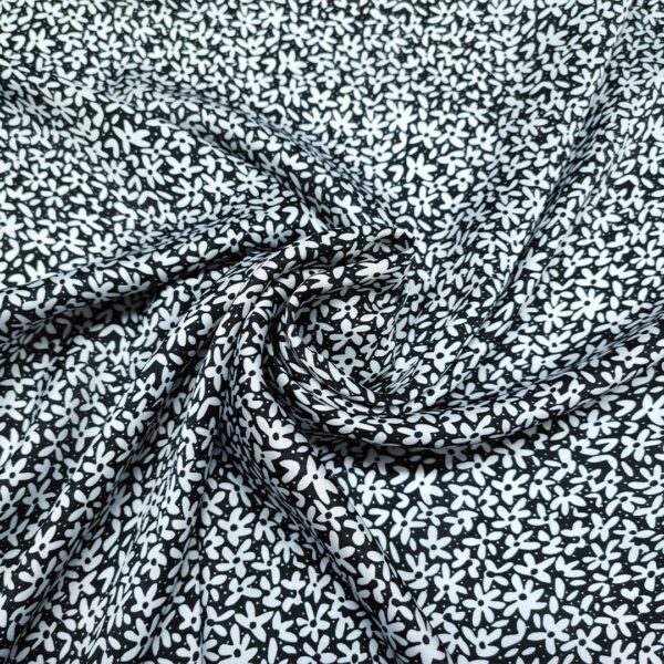 Tessuto Satin a fantasia motivo floreale nero - bianco