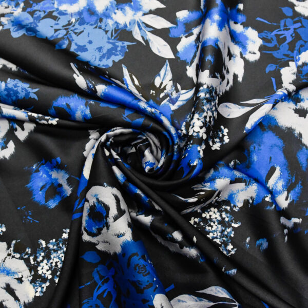 Tessuto Satin a fantasia motivo floreale nero - blu - bianco