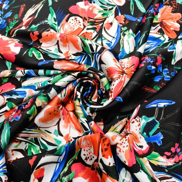 Tessuto Satin a fantasia motivo floreale nero - blu - rosso - bianco