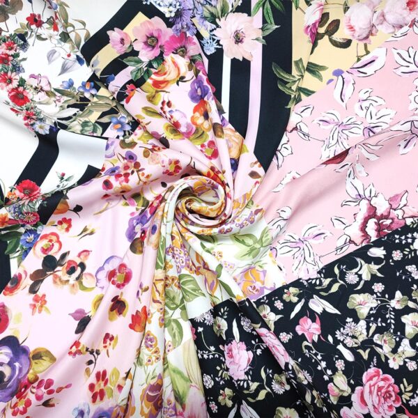 Tessuto Satin a fantasia motivo floreale nero - rosa - bianco