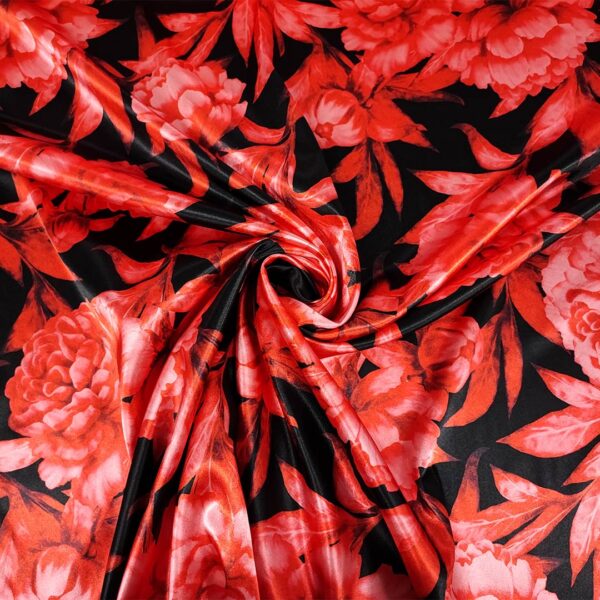 Tessuto Satin elasticizzato a fantasia motivo floreale nero - rosso corallo