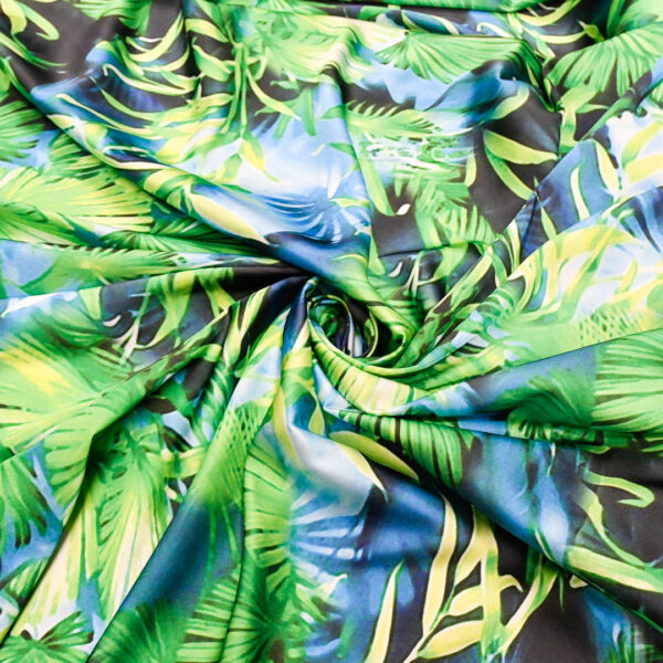 Tessuto Satin a fantasia motivo floreale verde prato - turchese