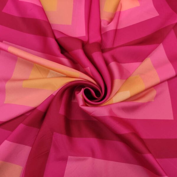 Tessuto Satin a fantasia motivo geometrico fucsia - arancione - pesco