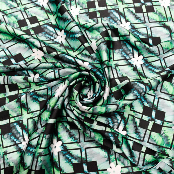 Tessuto Satin a fantasia motivo geometrico verde - nero - bianco