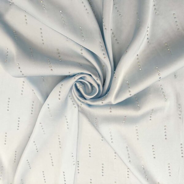 Tessuto Satin leggero con punti luce tinta unita celeste polvere