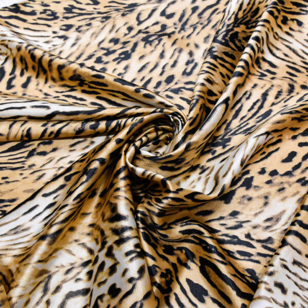Tessuto Satin a fantasia motivo animalier beige - nero