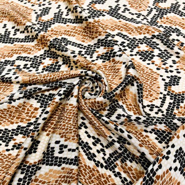 Tessuto Satin a fantasia motivo animalier nero - tabacco - beige