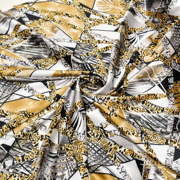Tessuto Satin a fantasia motivo astratto nero - giallo - bianco