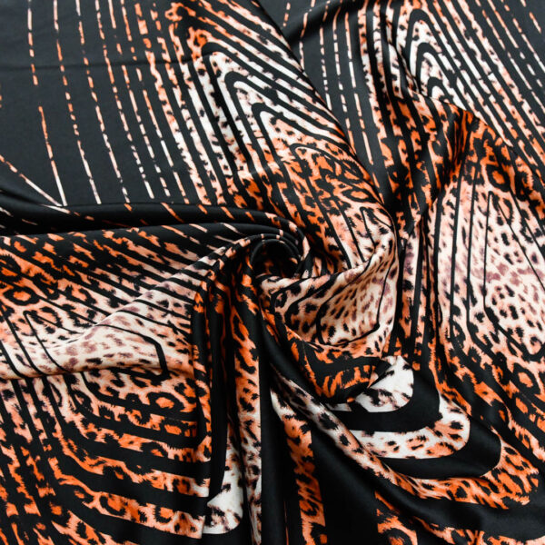 Tessuto Satin a fantasia motivo astratto nero - rosa