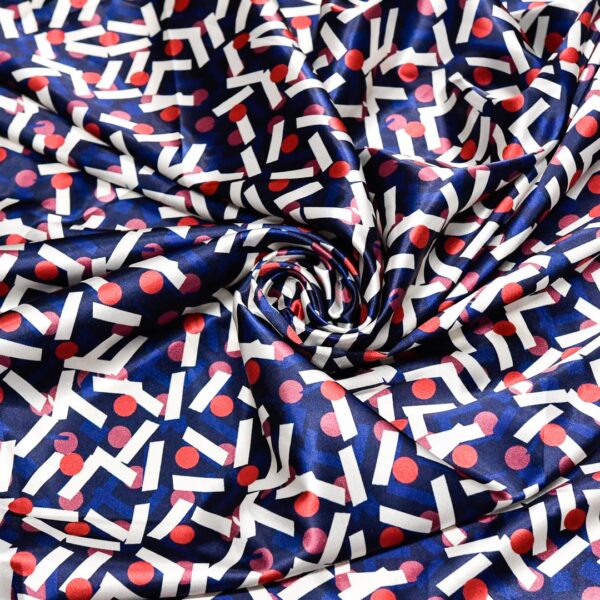 Tessuto Satin a fantasia motivo geometrico blu - rosso - bianco