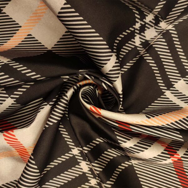 Tessuto Satin elasticizzato a fantasia quadri nero - beige - arancio