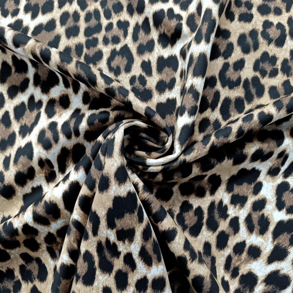Tessuto Scuba Crepe a fantasia motivo animalier beige - marrone - nero