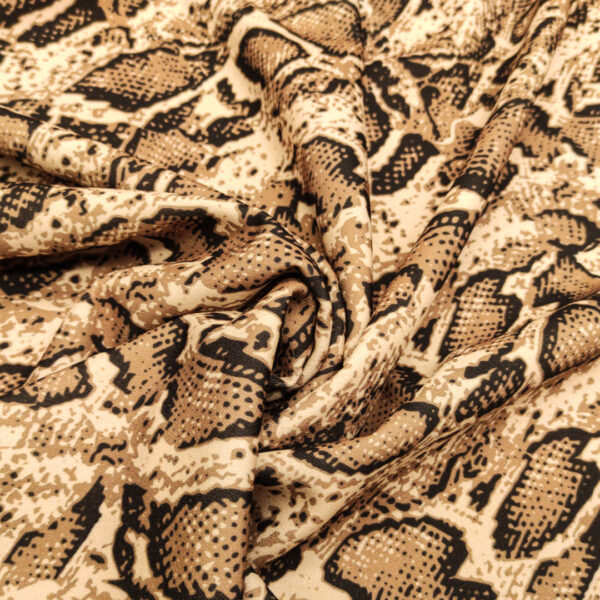 Tessuto Scuba Crepe a fantasia motivo animalier tabacco - beige chiaro - nero