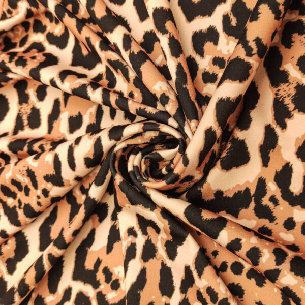 Tessuto Scuba Crepe a fantasia motivo animalier tabacco - beige - nero