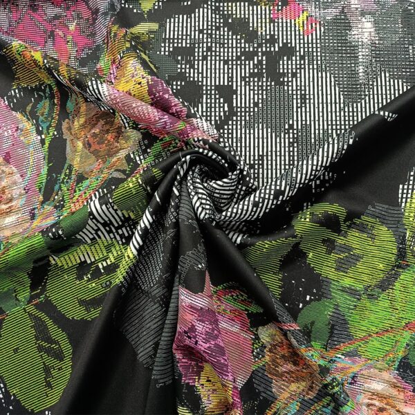 Tessuto Scuba Crepe a fantasia motivo astratto verde - fucsia - nero