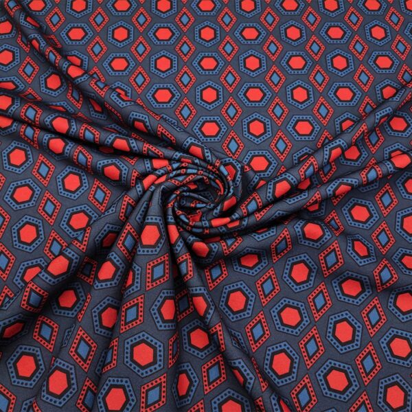 Tessuto Scuba Crepe a fantasia motivo geometrico verde ottanio - nero - arancio