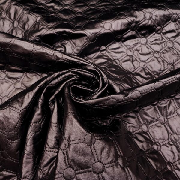Tessuto Trapunta double face in ecopelle peso leggero motivo geometrico nero
