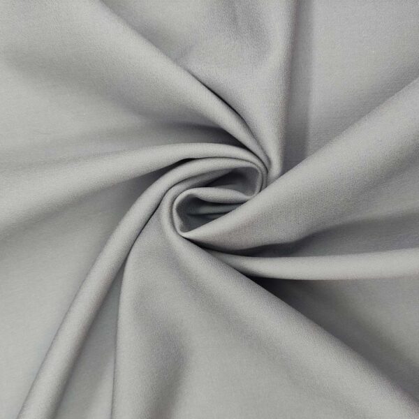 Tessuto triplo Cady mano lana double face tinta unita celeste polvere - panna