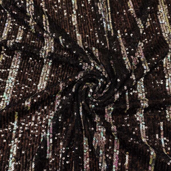 Tessuto Tulle elasticizzato ricamato con paillettes motivo astratto nero - aurora borale