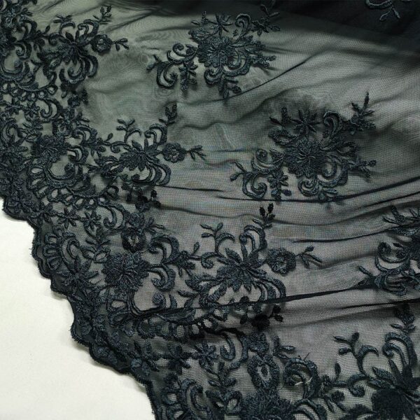Tessuto Tulle elasticizzato ricamato smerlato motivo floreale nero